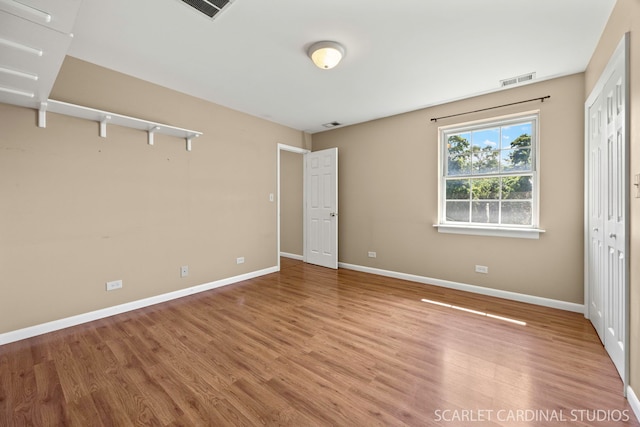 7334 Maridon Rd, Countryside, IL 60525 - unfurnished bedroom featuring light wood-style floors and a closet