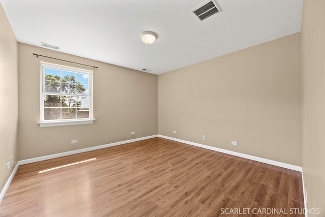 7334 Maridon Rd, Countryside, IL 60525 - unfurnished room with baseboards and wood finished floors