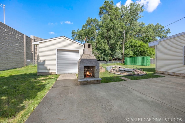 7334 Maridon Rd, Countryside, IL 60525 - view of patio featuring a lit fireplace