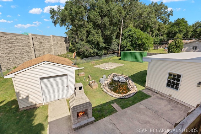 7334 Maridon Rd, Countryside, IL 60525 - view of yard with a lit fireplace and a patio