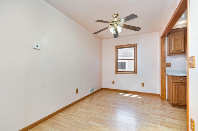 230 Brierhill Dr, Round Lake Park, IL 60073 - unfurnished room featuring light wood-type flooring and a ceiling fan