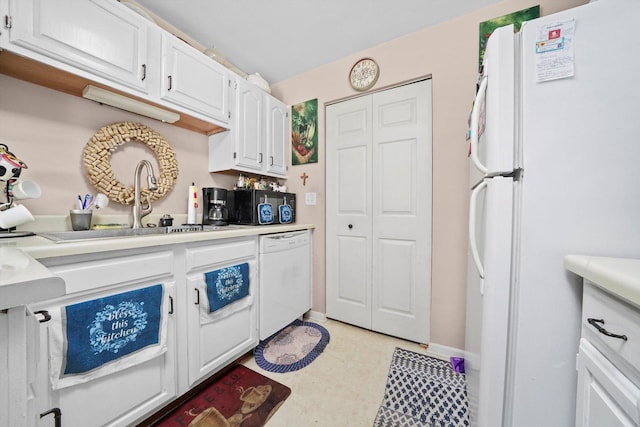 240 Crestview Dr Unit B, Wauconda, IL 60084 - kitchen with white appliances, white cabinetry, light countertops, and light floors