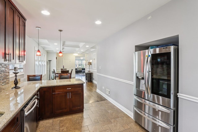 8120 S Luella Ave, Chicago, IL 60617 - kitchen featuring stainless steel appliances, a peninsula, recessed lighting, light stone counters, and hanging light fixtures
