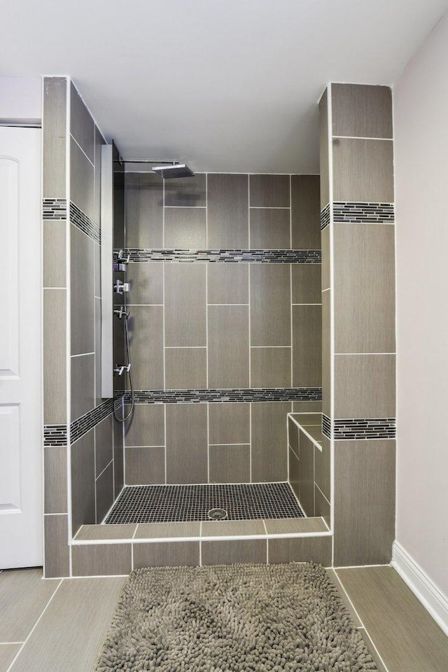 8120 S Luella Ave, Chicago, IL 60617 - bathroom featuring a tile shower