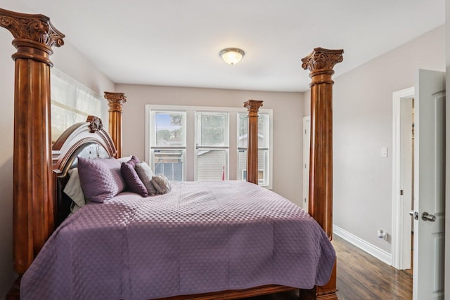 8120 S Luella Ave, Chicago, IL 60617 - bedroom with baseboards and dark wood finished floors