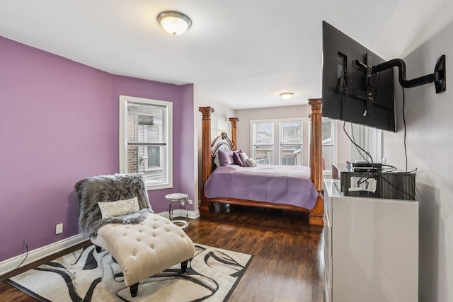 8120 S Luella Ave, Chicago, IL 60617 - bedroom featuring multiple windows and wood finished floors