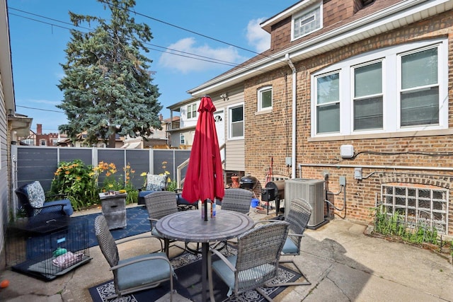 8120 S Luella Ave, Chicago, IL 60617 - fenced backyard featuring a patio and outdoor dining area