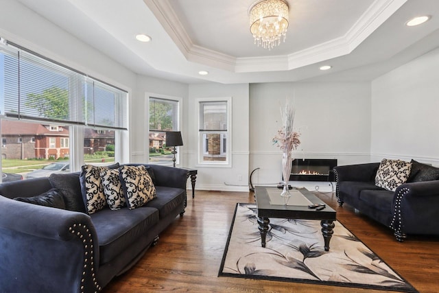 8120 S Luella Ave, Chicago, IL 60617 - living area with ornamental molding, a raised ceiling, a chandelier, wood finished floors, and recessed lighting