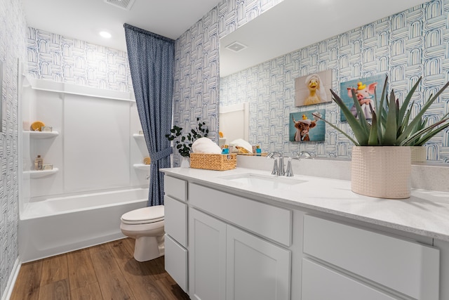 529 S Kincaid St, Maple Park, IL 60151 - full bath featuring wallpapered walls, vanity, wood finished floors, shower / washtub combination, and recessed lighting