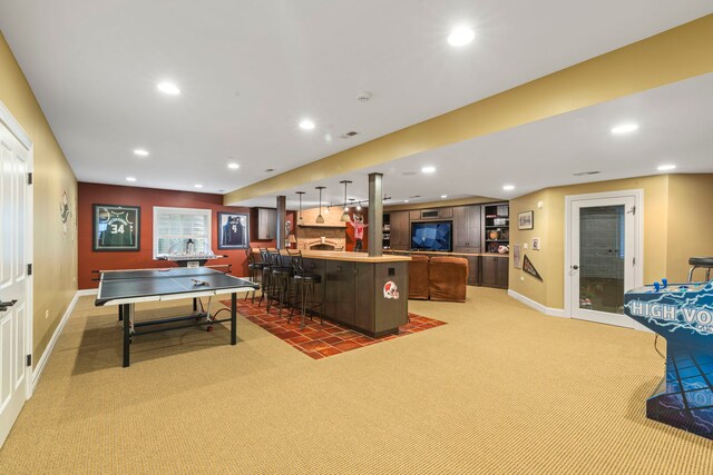 3550 Sorrel Dr, Northbrook, IL 60062 - recreation room with bar with sink, light carpet, and recessed lighting