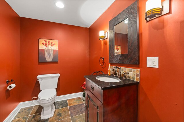 3550 Sorrel Dr, Northbrook, IL 60062 - bathroom with stone tile flooring, vanity, and backsplash