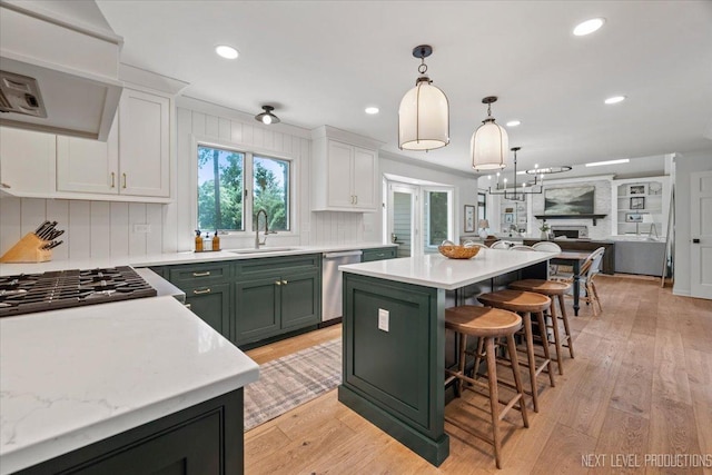 1412 Sherwood Ln, Geneva, IL 60134 - kitchen featuring green cabinets, stainless steel dishwasher, custom range hood, light countertops, and a kitchen island