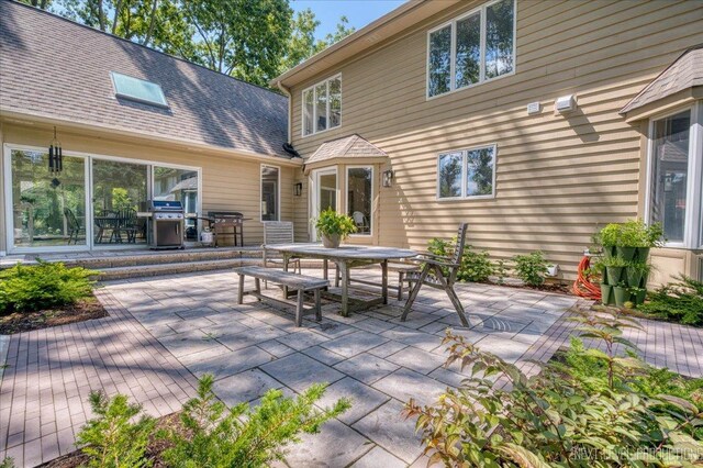 1412 Sherwood Ln, Geneva, IL 60134 - view of patio featuring outdoor dining space and area for grilling