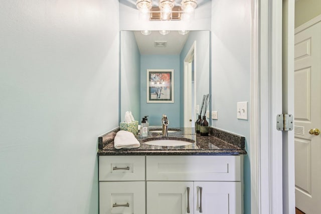 454 Blue Springs Dr, Fox Lake, IL 60020 - bathroom featuring vanity and a chandelier
