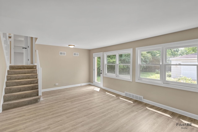 2059 Downey Rd, Homewood, IL 60430 - unfurnished room featuring light wood-style floors and stairs