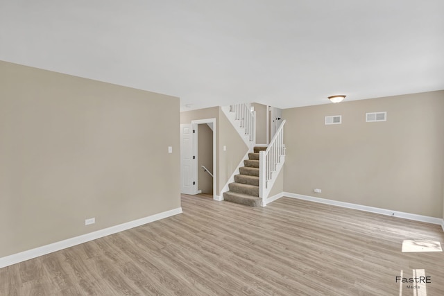 2059 Downey Rd, Homewood, IL 60430 - unfurnished living room with light wood finished floors and stairway