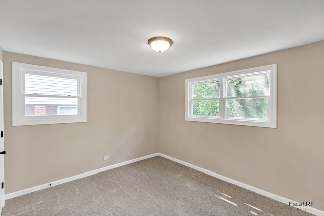 2059 Downey Rd, Homewood, IL 60430 - carpeted empty room featuring baseboards