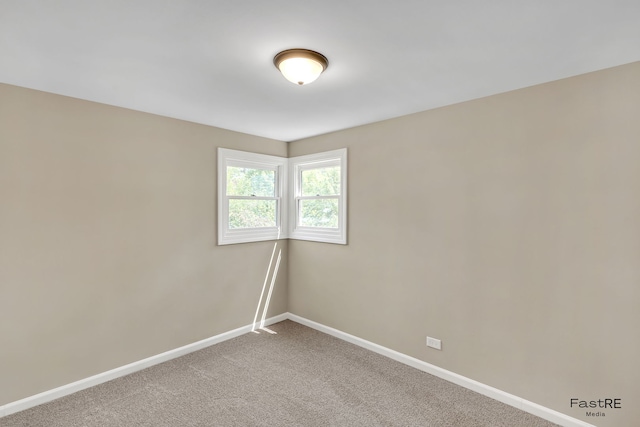 2059 Downey Rd, Homewood, IL 60430 - carpeted empty room featuring baseboards
