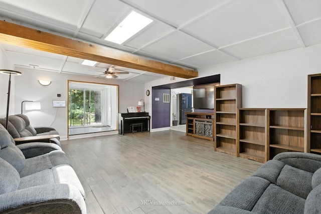 204 Wood St, Wilmington, IL 60481 - living area featuring wood finished floors, ceiling fan, and beam ceiling