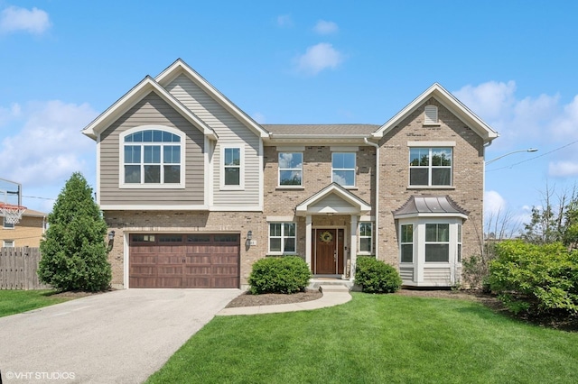 161 N Schubert St, Palatine, IL 60067 - view of front of home with concrete driveway, an attached garage, and brick siding