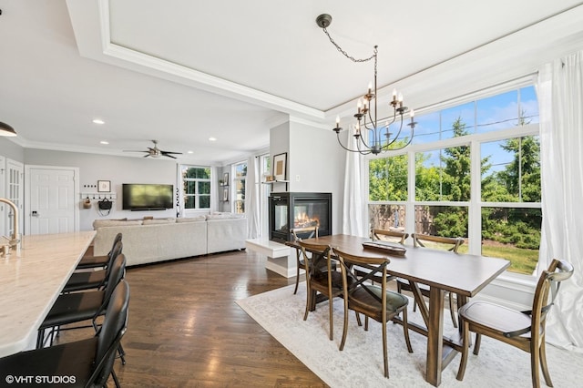 161 N Schubert St, Palatine, IL 60067 - dining space with a multi sided fireplace, ornamental molding, recessed lighting, a chandelier, and dark wood-type flooring
