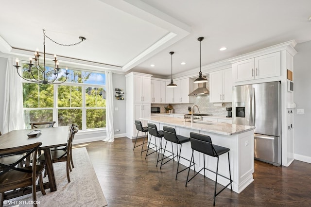 161 N Schubert St, Palatine, IL 60067 - kitchen featuring stainless steel refrigerator with ice dispenser, a tray ceiling, a chandelier, tasteful backsplash, and recessed lighting
