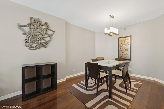 195 N Harbor Dr Unit 709, Chicago, IL 60601 - dining area featuring dark wood-style flooring and a chandelier