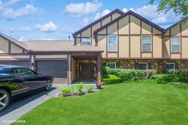 2261 Petworth Ct Unit 201C, Naperville, IL 60565 - tudor home with stucco siding, stone siding, a front lawn, a garage, and driveway