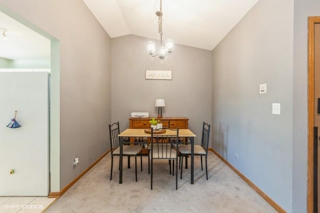 2261 Petworth Ct Unit 201C, Naperville, IL 60565 - dining space with lofted ceiling, a chandelier, and light carpet