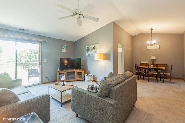 2261 Petworth Ct Unit 201C, Naperville, IL 60565 - living room featuring light colored carpet, lofted ceiling, a chandelier, and ceiling fan