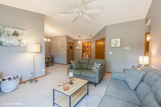 2261 Petworth Ct Unit 201C, Naperville, IL 60565 - living area featuring light carpet, a ceiling fan, and vaulted ceiling