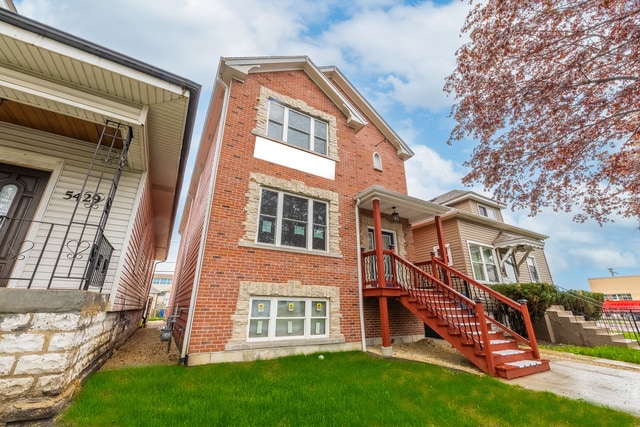 5326 W 31st St, Cicero, IL 60804 - view of front of property featuring stairs, brick siding, and a front yard
