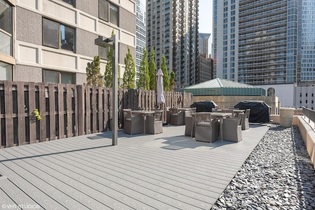 33 W Delaware Pl Unit 13E, Chicago, IL 60610 - deck with outdoor dining space and a view of city
