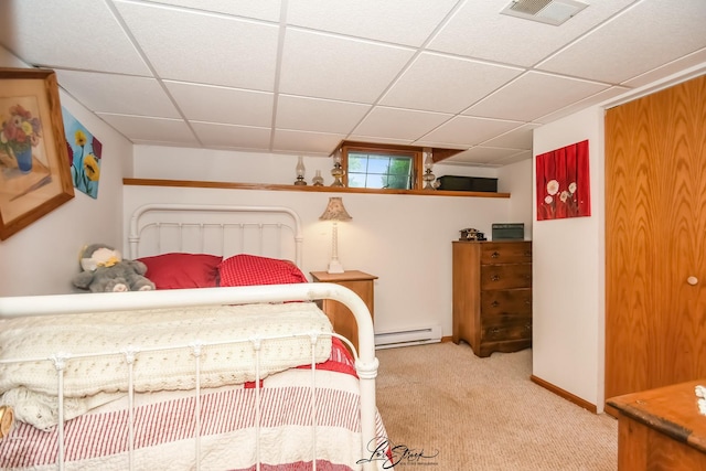 712 Hauert St, Peotone, IL 60468 - carpeted bedroom featuring a drop ceiling and baseboard heating