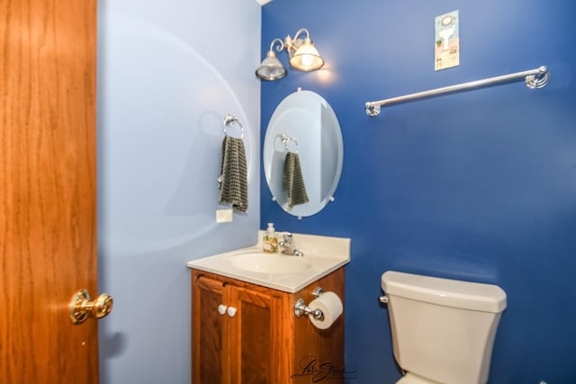 712 Hauert St, Peotone, IL 60468 - bathroom featuring toilet and vanity