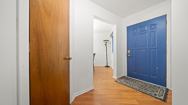 5715 Elaine Dr, Rockford, IL 61108 - foyer entrance featuring light wood finished floors and baseboards