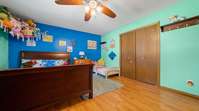 5715 Elaine Dr, Rockford, IL 61108 - bedroom with wood finished floors, a closet, and a ceiling fan