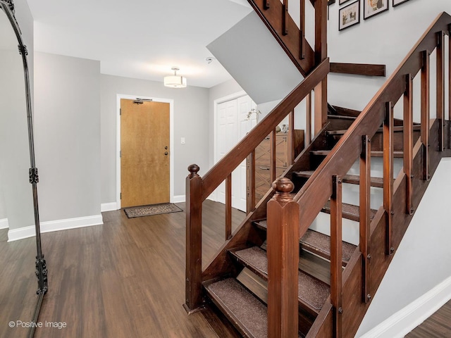 1401 Burr Oak Rd Unit 312B, Hinsdale, IL 60521 - stairway featuring wood finished floors and baseboards