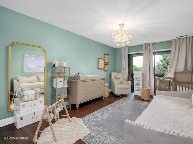 1401 Burr Oak Rd Unit 312B, Hinsdale, IL 60521 - bedroom with wood finished floors, a chandelier, and access to exterior