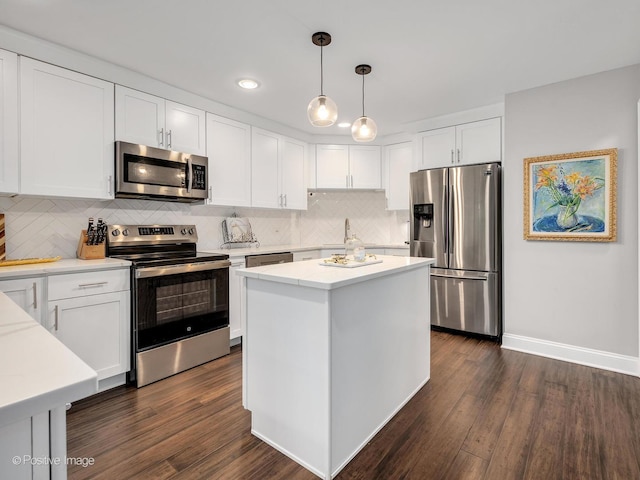 1401 Burr Oak Rd Unit 312B, Hinsdale, IL 60521 - kitchen featuring appliances with stainless steel finishes, dark wood finished floors, tasteful backsplash, white cabinetry, and recessed lighting