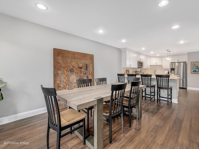 1401 Burr Oak Rd Unit 312B, Hinsdale, IL 60521 - dining area with dark wood-style flooring and recessed lighting
