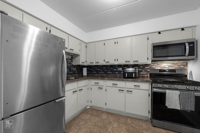 2541 Thatcher Ave Unit 2D, River Grove, IL 60171 - kitchen with appliances with stainless steel finishes, decorative backsplash, and white cabinetry