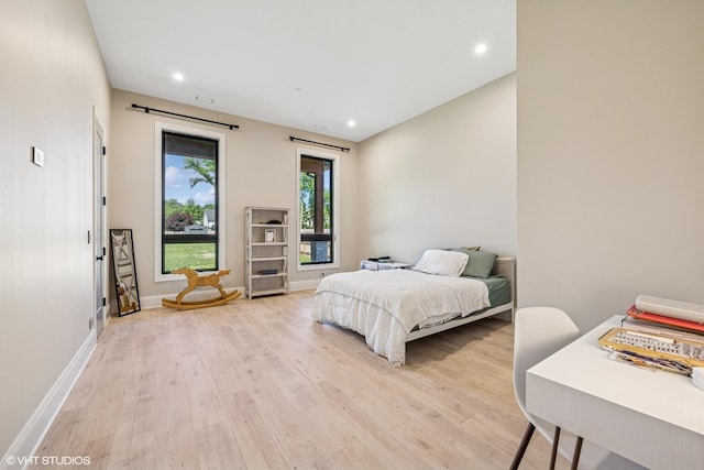2104 Shermer Rd, Northbrook, IL 60062 - bedroom with light wood finished floors and recessed lighting