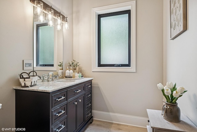 2104 Shermer Rd, Northbrook, IL 60062 - bathroom with vanity and wood finished floors