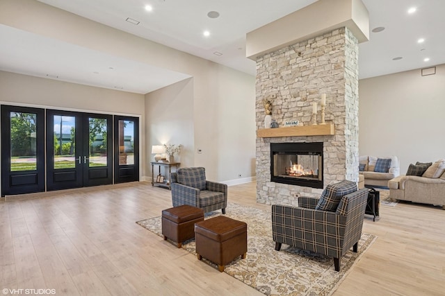 2104 Shermer Rd, Northbrook, IL 60062 - living room featuring wood finished floors, a fireplace, and recessed lighting
