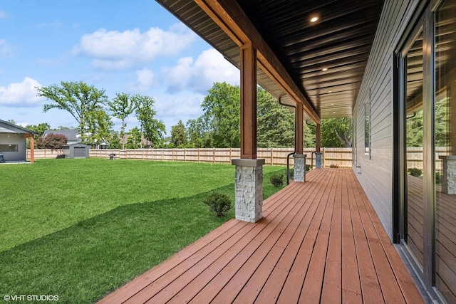 2104 Shermer Rd, Northbrook, IL 60062 - deck with a fenced backyard and a shed