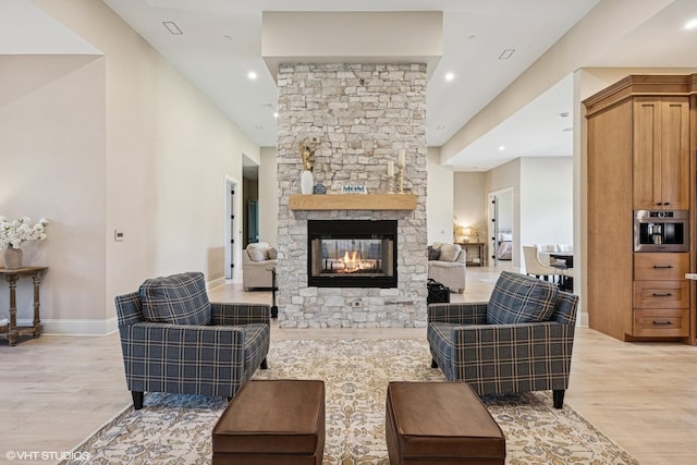2104 Shermer Rd, Northbrook, IL 60062 - living room featuring light wood-style floors, a fireplace, and recessed lighting