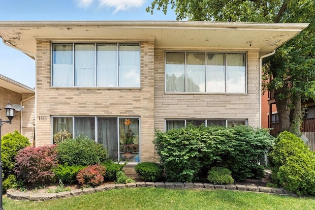 1111 N Harlem Ave Unit 1C, Oak Park, IL 60302 - back of house featuring brick siding