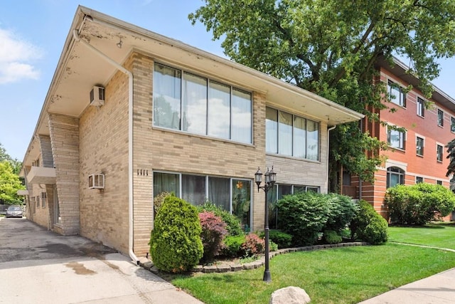 1111 N Harlem Ave Unit 1C, Oak Park, IL 60302 - view of property featuring a wall mounted AC