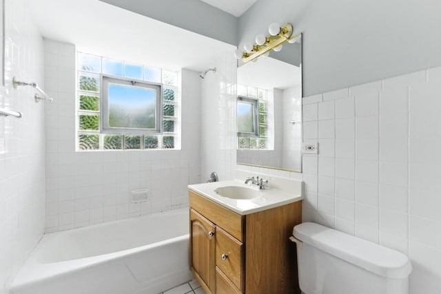 1111 N Harlem Ave Unit 1C, Oak Park, IL 60302 - bathroom featuring vanity, tile walls, and  shower combination